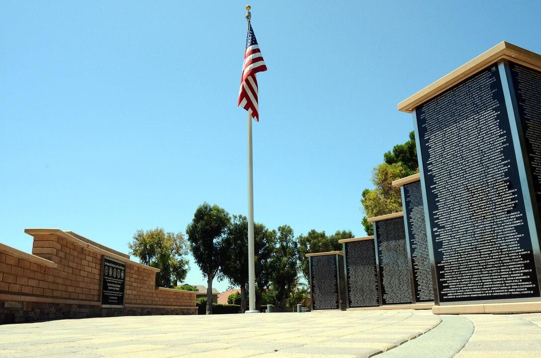 Jennifer Marino, a retired major, is cycling more than 2,700 miles, through 17 states, over the span of 77 days to meet with American Gold Star Mothers and their families in commemoration of service members killed in combat. One of Marino’s stops is the Northwood Gratitude and Honor Memorial in Irvine, Calif. where she gathered rubbings of the names of several service members. She plans to hand deliver the names to some of the families she will visit as she crosses the country.
