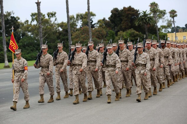 Recruit Andrew K. Roelle, Platoon 1070, Company D, 1st Recruit Training Battalion, leads his fellow platoon members during Final Drill aboard Marine Corps Recruit Depot San Diego, Aug. 7. Recruits were graded on various drill movements such as sling arms and by the left and right flank