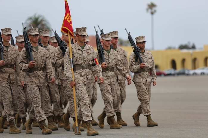 Recruit Andrew K. Roelle, guide, Platoon 1070, Company D, 1st Recruit Training Battalion, leads his fellow platoon members during Final Drill aboard Marine Corps Recruit Depot San Diego, Aug. 7. Recruits were graded on various drill movements such as sling arms and by the left and right flank.