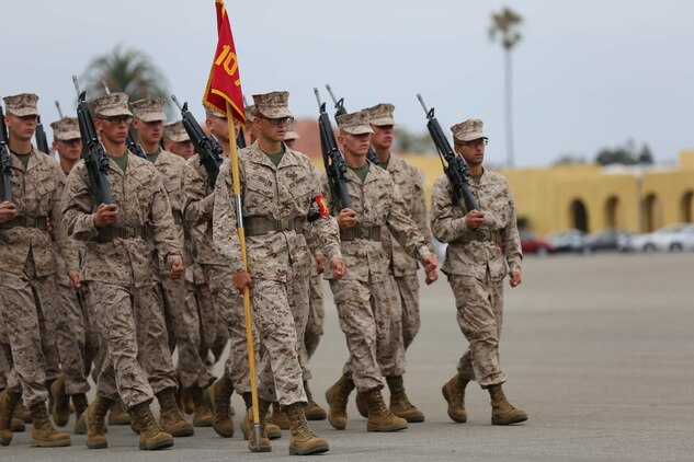 Recruit Andrew K. Roelle, guide, Platoon 1070, Company D, 1st Recruit Training Battalion, leads his fellow platoon members during Final Drill aboard Marine Corps Recruit Depot San Diego, Aug. 7. Recruits were graded on various drill movements such as sling arms and by the left and right flank.