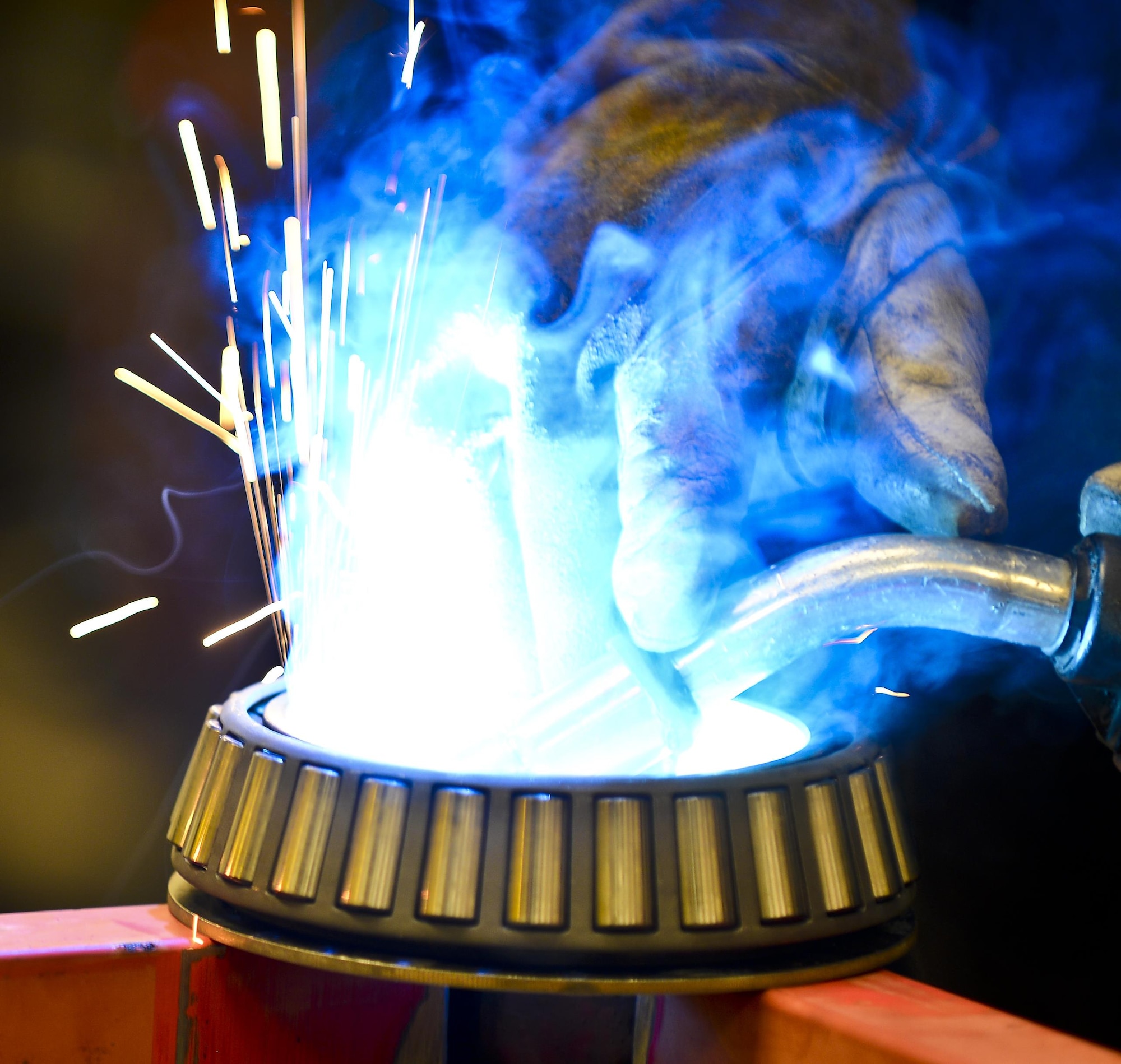 A rotational plate is welded together, Aug 22, 2013 at MacDill Air Force Base, Fla. Two Airmen from MacDill co-engineered a way to centrifugally mount a KC-135 Stratotanker’s nose and main landing wheel on a rotating base, which reduces a wheel’s paint process by 50 percent.