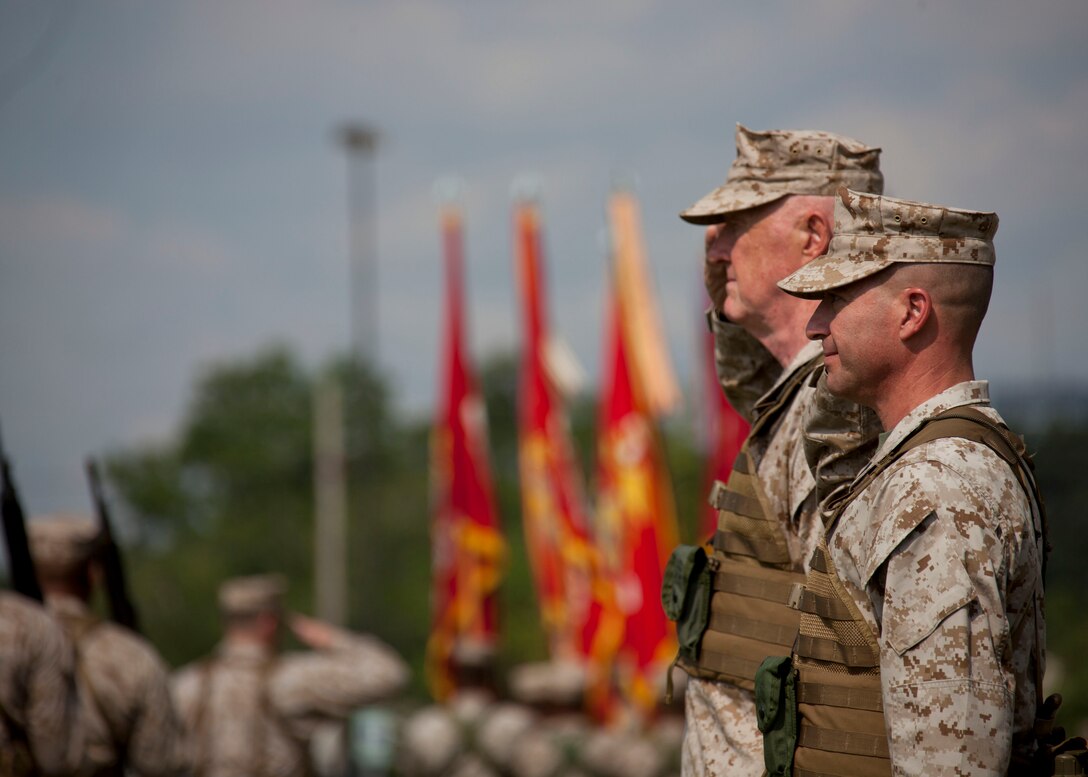 Lt. Gen. Richard P. Mills, the commander of Marine Forces Reserve and Marine Forces North, and Sgt. Maj. Anthony A. Spadaro, the sergeant major of MARFORRES and MARFORNORTH, salute their Marines during the pass-in-review at the MARFORRES assumption of command and appointment ceremony aboard Marine Corps Support Facility New Orleans, Aug. 28, 2013. Mills is taking charge of the largest command in the Marine Corps, encompassing more than 100,000 Marines at more than 160 sites in 47 U.S. states, Guam and Puerto Rico. 