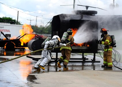 Joint Task Force-Bravo is hosting the Central America Sharing Mutual Operational Knowledge and Experiences (CENTAM Smoke) Exercise here Aug. 26-29, 2013 and for the first time all seven nations are present. JTF-Bravo firefighters will train alongside Hondurans, Belizeans, Costa Ricans, Guatemalans, El Salvadorans, Panamanians and Nicaraguans partner nation firefighters allowing the U.S. and Central America firefighters four days of team-building exercises. (Photograph released by U.S. Air Force Staff Sgt. Jarrod Chavana)