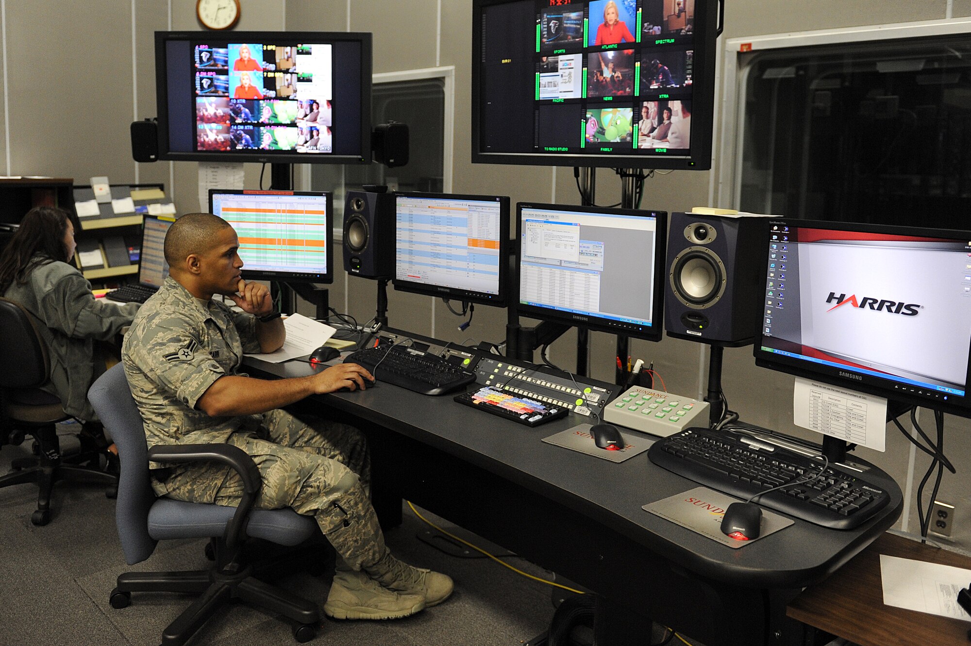 YOKOTA AIR BASE, Japan -- Airman 1st Class Kellen Carr, American Forces Network broadcaster, schedules required shows for television, Aug. 9, 2013, at Yokota Air Base, Japan.  American Forces Network provides high definition sports to their channels. (U.S. Air Force photo by Airman 1st Class Meagan Schutter)
