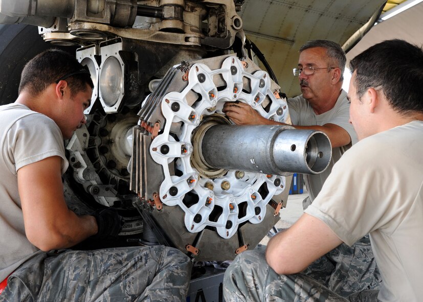 Airman 1st Class Rafael Padin, left, 2nd Aircraft Maintenance Squadron airframe power-plant general journeyman, Tech. Sgt. Robert Berg, 2nd AMXS APG craftsman, and Senior Airman Cory Sanden, 2nd AMXS APG journeyman, install a brake pad to the #3 wheel of a B-52H Stratofortress on Barksdale Air Force Base, La., Aug. 28, 2013. The #3 brake, wheel and tire assembly of the aircraft had to be replaced due to an aircraft fire. (U.S. Air Force photo/Senior Airman Joseph Pagán)