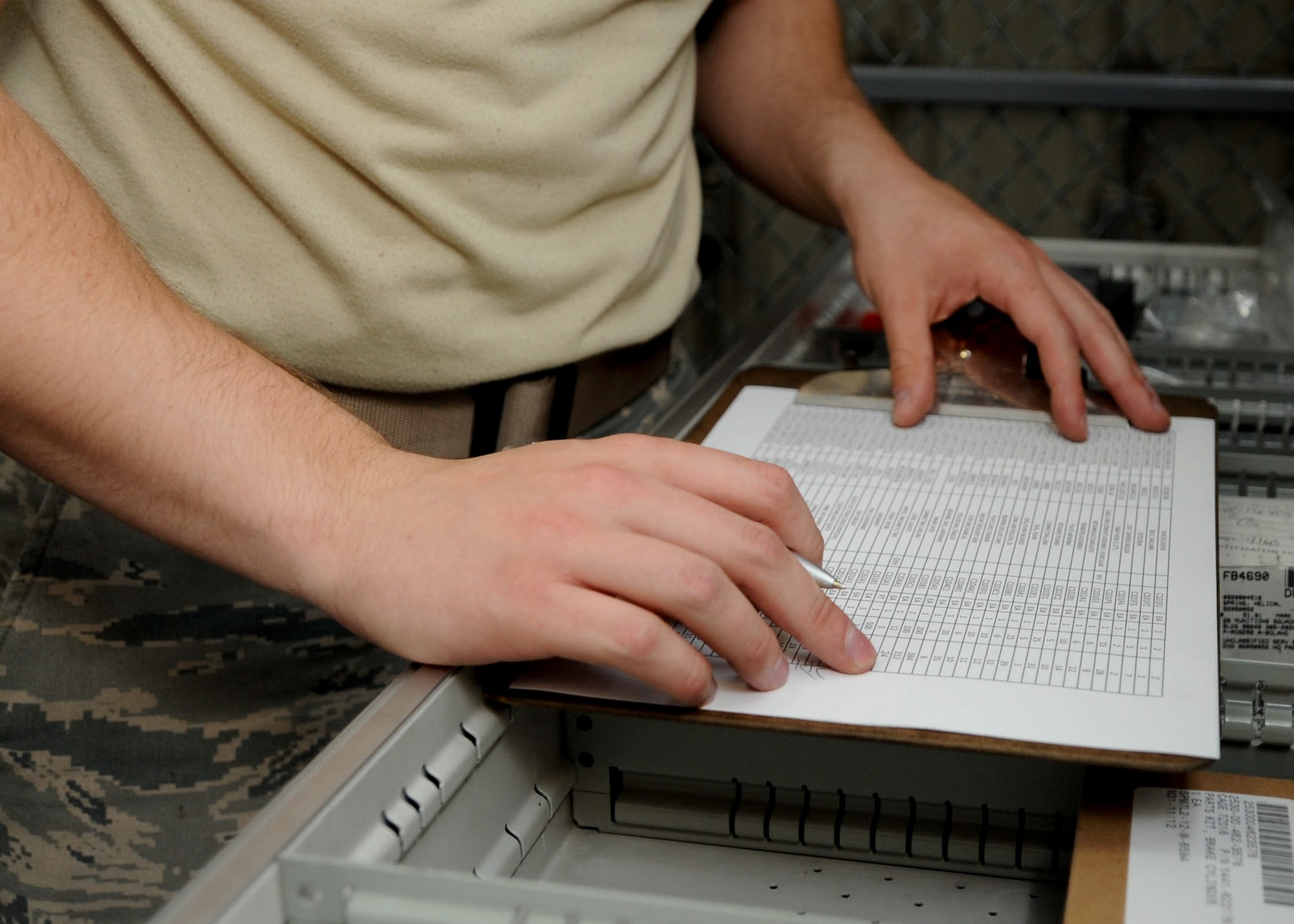 Airman 1st Class David Heller, 28th Munitions Squadron equipment support technician, updates bench stock items on an inventory list at the equipment maintenance shop on Ellsworth Air Force Base, S.D., Aug. 20, 2013. Technicians use this list to ensure all 230 bench stock items are on hand in order to maintain all support and munitions trailers. (U.S. Air Force photo by Airman 1st Class Rebecca Imwalle)