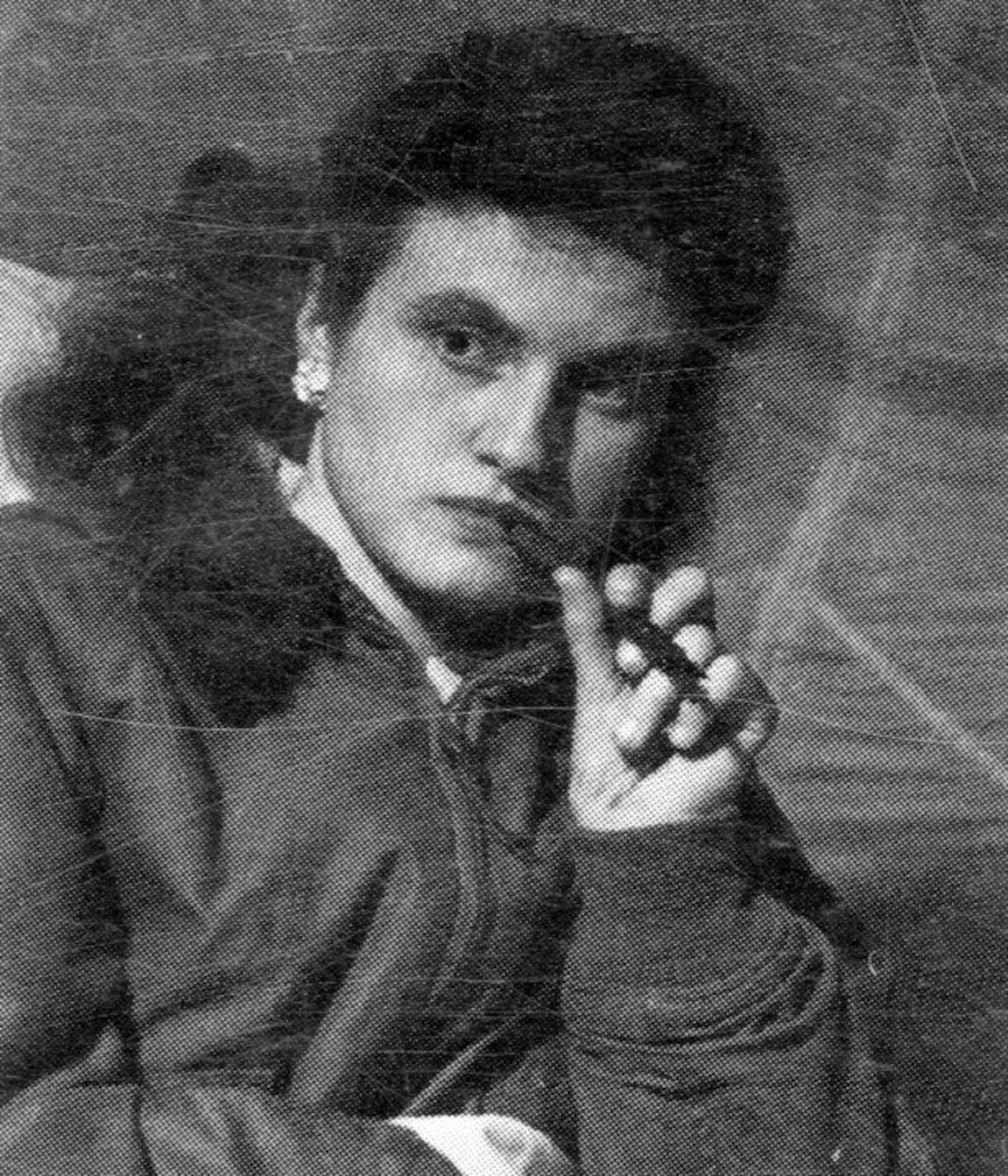 Yvette Hamel strikes a pensive pose in her parachute silk-lined tent during her unofficial recuperation with the 371st Fighter Group in France during late 1944. (From Annie Laurie Morgan’s book “Sunward I’ve Climbed”)
