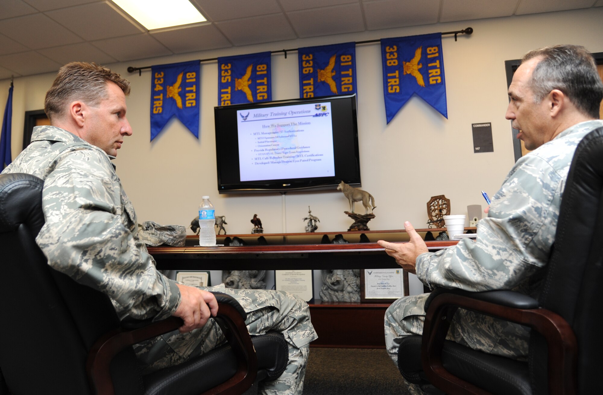 Brig. Gen. Patrick Higby, 81st Training Wing commander, is briefed on the operations of the Military Training Leaders by Col. George Tombe, 81st Training Group commander, during his two-day immersion tour of the 81st Training Group Aug. 26-27, 2013, at the Levitow Training Support Facility, Keesler Air Force Base, Miss.  The purpose of the tour was to learn the integration of the group’s mission, operations and personnel.  Higby will continue his tour with the 81st Medical Group, 81st Mission Support Group and Wing Staff Agencies over the next couple of weeks.  (U.S. Air Force photo by Kemberly Groue)