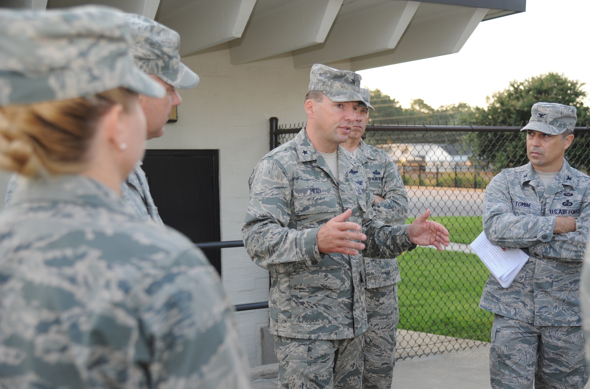 Brig. Gen. Patrick Higby, 81st Training Wing commander, asks questions about the training received by the 334th Training Squadron battlefield Airmen at the Triangle pool during a two-day immersion tour of the 81st Training Group Aug. 26-27, 2013, at Keesler Air Force Base, Miss.  The purpose of the tour was to learn the integration of the group’s mission, operations and personnel. Higby will continue his tour with the 81st Medical Group, 81st Mission Support Group and Wing Staff Agencies over the next couple of weeks.  (U.S. Air Force photo by Kemberly Groue)