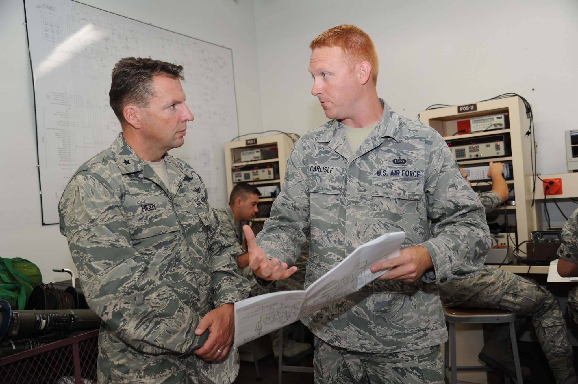 Brig. Gen. Patrick Higby, 81st Training Wing commander, is provided an overview on the radio frequency transmissions course by Tech. Sgt. Ryan Carlisle, 338th Training Squadron, during a two-day immersion tour of the 81st Training Group Aug. 26-27, 2013, at Jones Hall, Keesler Air Force Base, Miss.  The purpose of the tour was to learn the integration of the group’s mission, operations and personnel.  Higby will continue his tour with the 81st Medical Group, 81st Mission Support Group and Wing Staff Agencies over the next couple of weeks.  (U.S. Air Force photo by Kemberly Groue)
