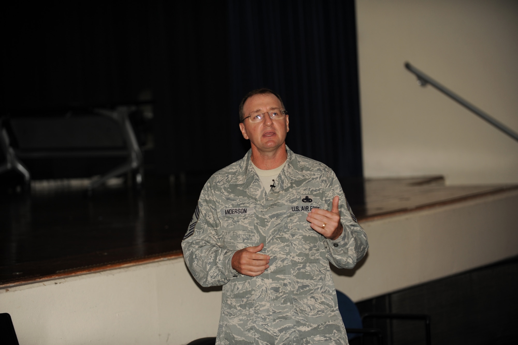 Chief Master Sgt. Marty Anderson, 375th Air Mobility Wing command chief, speaks to Scott members at the professional development lunch in the library auditorium Aug. 23 at Scott Air Force Base. The topic of the Professional Development Lunch the importance of feedback for performance reviews and being proactive as the Air Force looks to change the enlisted performance review system. (U.S. Air Force Photo/Airman 1st Class Joshua Eikren)
