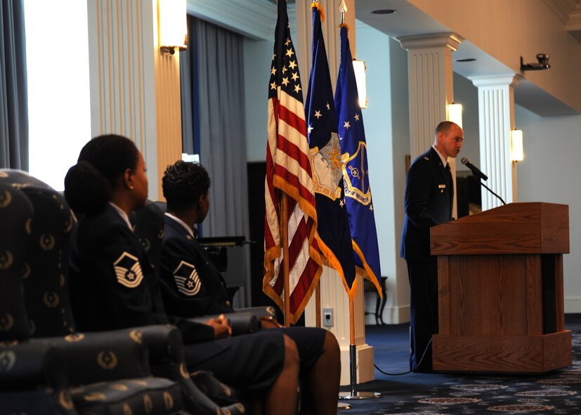 Air Force District of Washington vice commander Col. Michael Gantt presides over the AFDW bi-montly retirement ceremony Aug. 27, 2013, at The Club on Joint Base Anacostia-Bolling, D.C. Gnatt retired Master Sergeants Judith Hall (left) and Quiltina Smith. Hall served as an Administrative Control Program assistant for the 201st Mission Support Squadron, Air National Guard Readiness Center at Joint Base Andrews, Md. Smith served as an Air Force representative at the National Defense University at Fort McNair, D.C. (U.S. Air Force photo by Tech. Sgt. Tammie Moore)