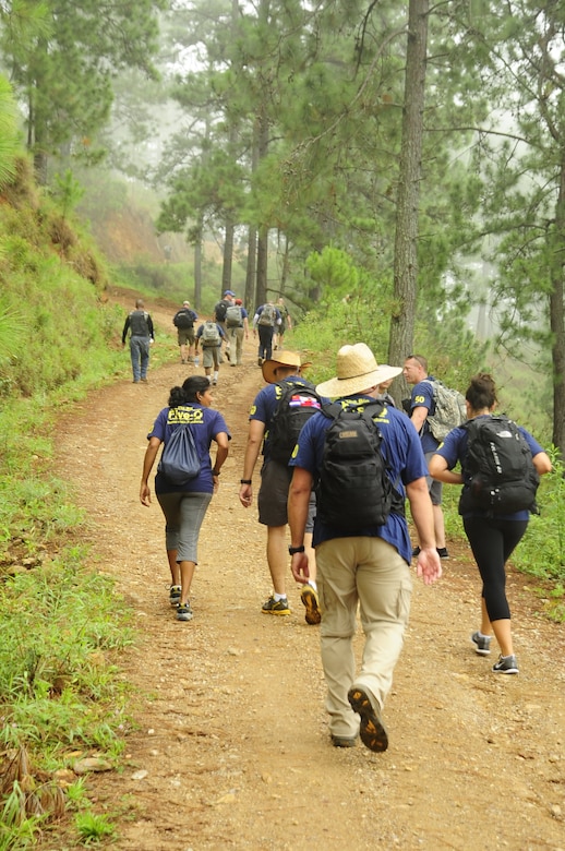 More than 80 Joint Task Force-Bravo personnel celebrated the Chapel’s 50th humanitarian hike, by trekking more than seven miles up a steep mountain road near Comayagua to deliver goods to people living in a remote village, Aug 24, 2013.  The Chapel Hike has been a tradition at Joint Task Force-Bravo since 2007, where volunteers carry food, supplies, toys and other provisions to remote villagers. (Photograph released by U.S. Air Force Staff Sgt. Jarrod R. Chavana)