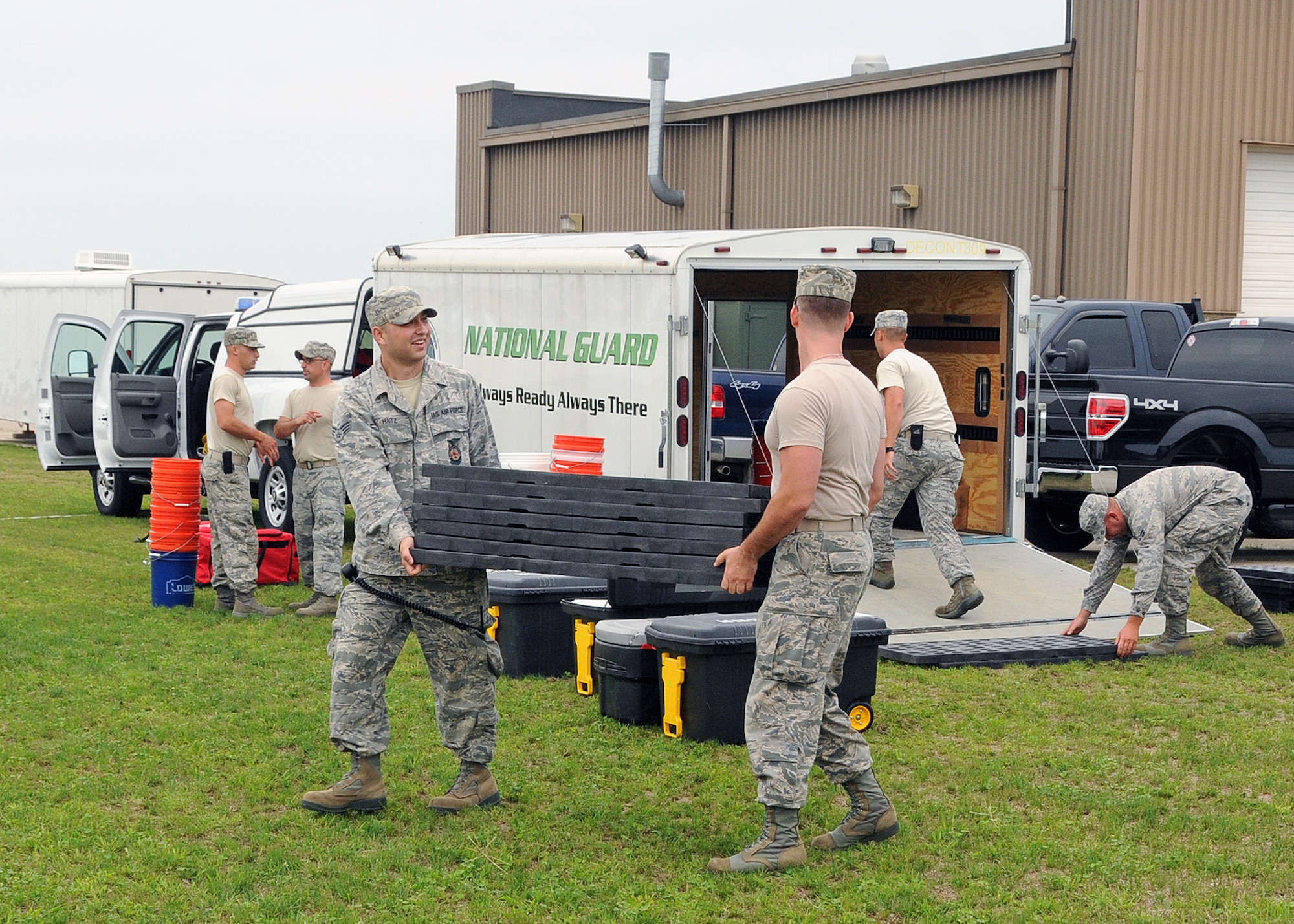 Members of the 143d Airlift Wing involved in the Region 1 Chemical, Biological, Radiological, Nuclear, High Yield Explosive Enhanced Response Force Package (CERFP) perform a training exercise to demonstrate the team's responsibilities and capabilities to potential new members and leadership. The Region 1 CERFP is made up of members of the Air and Army National Guard from Maine, New Hampshire, and Rhode Island. National Guard Photo by Master Sgt Janeen Miller (RELEASED)