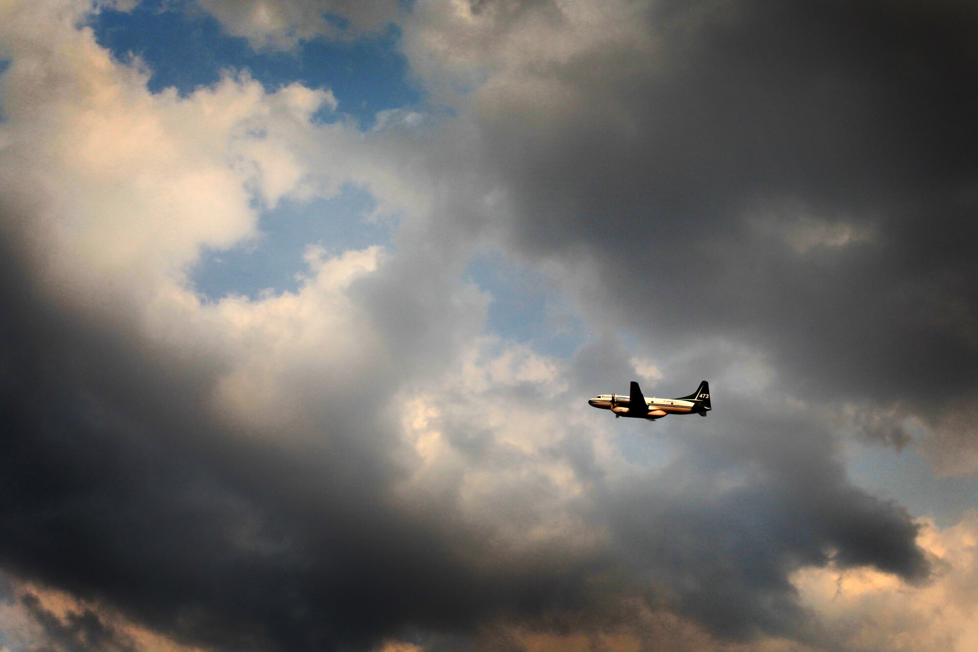An airplane helps with firefighting efforts Aug. 13, 2013 near Rockport Reservoir in Warship, Utah.  Fire season has begun in the western states, making it all the more important to apply fire prevention and safety practices.  (U.S. Air Force photo/Senior Airman Jette Carr)