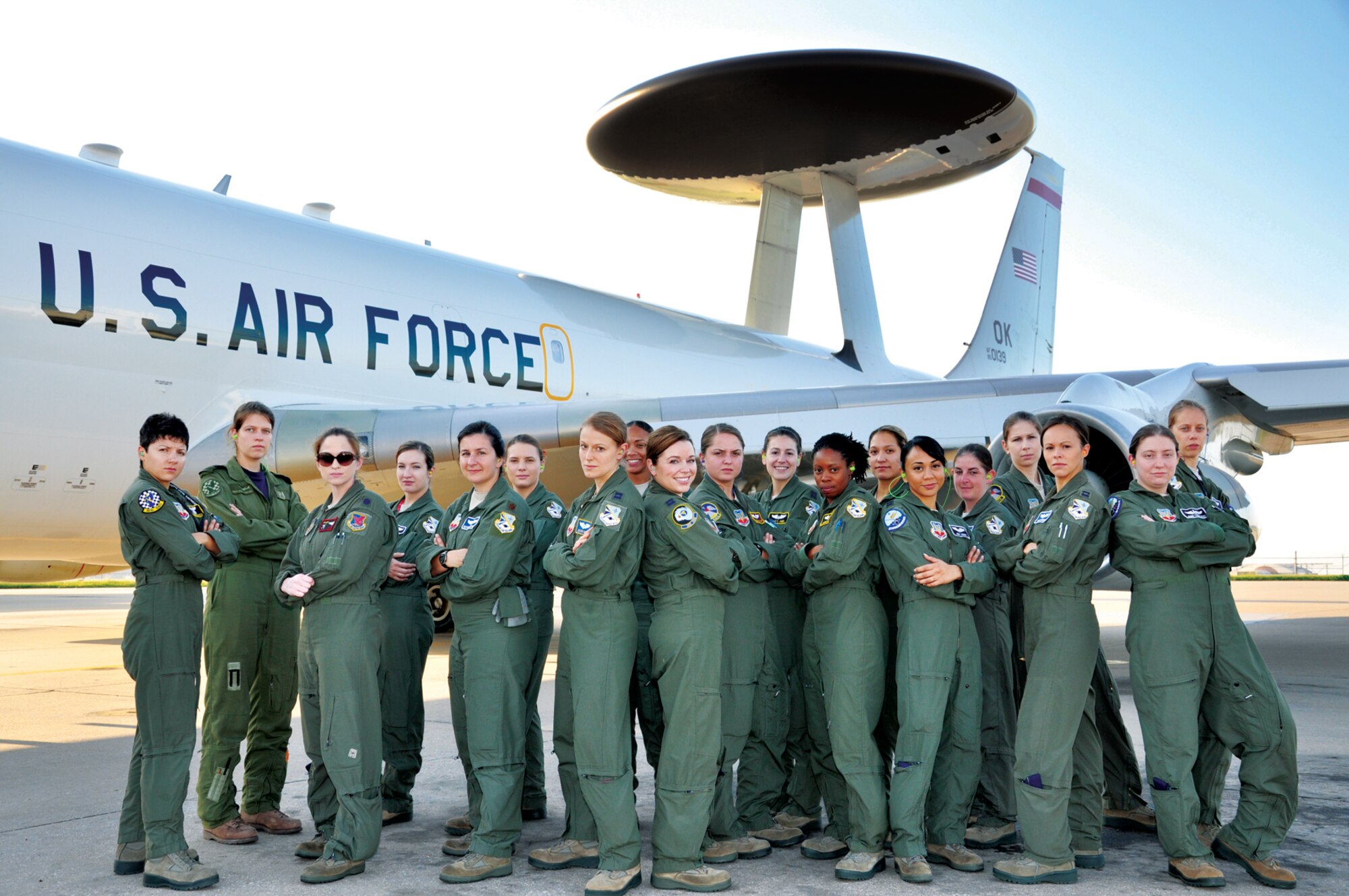 Airmen with the 552nd Air Control Wing and 513th Air Control Group pose for a photograph prior to making an historic all-female flight on Aug. 23. (Air Force photo by Darren D. Heusel)