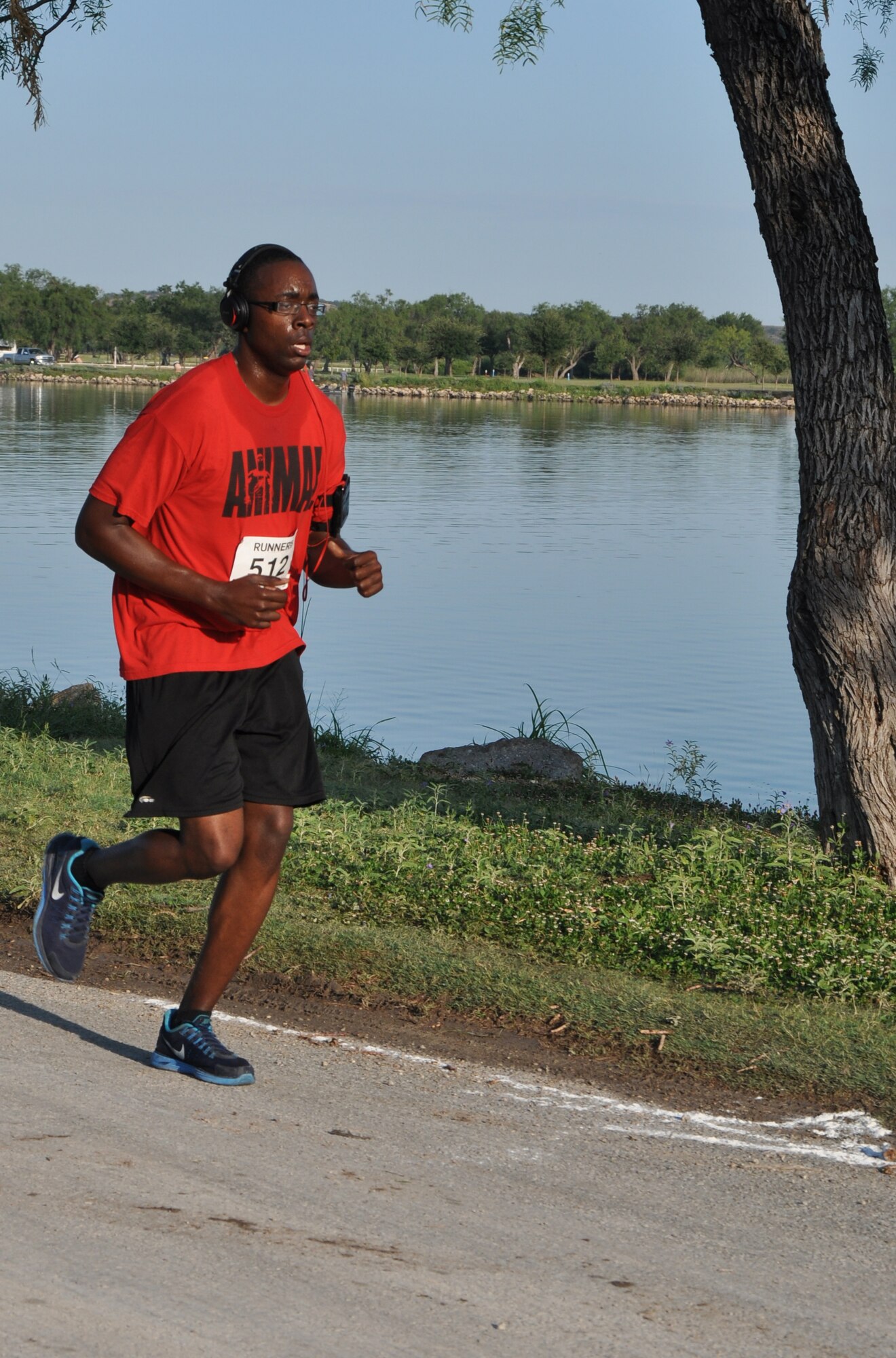 SAN ANGELO, Texas – Staff Sgt. Louis Perry, 315th Training Squadron military training instructor, competes in the Armydillo two-mile fun run at the 19th Annual Armydillo at the Spring Creek Marina and RV Park Aug 24. Perry and other military members attended the Armydillo to show their support of the Army. (U.S. Air Force photo/ Airman 1st Class Joshua Edwards)