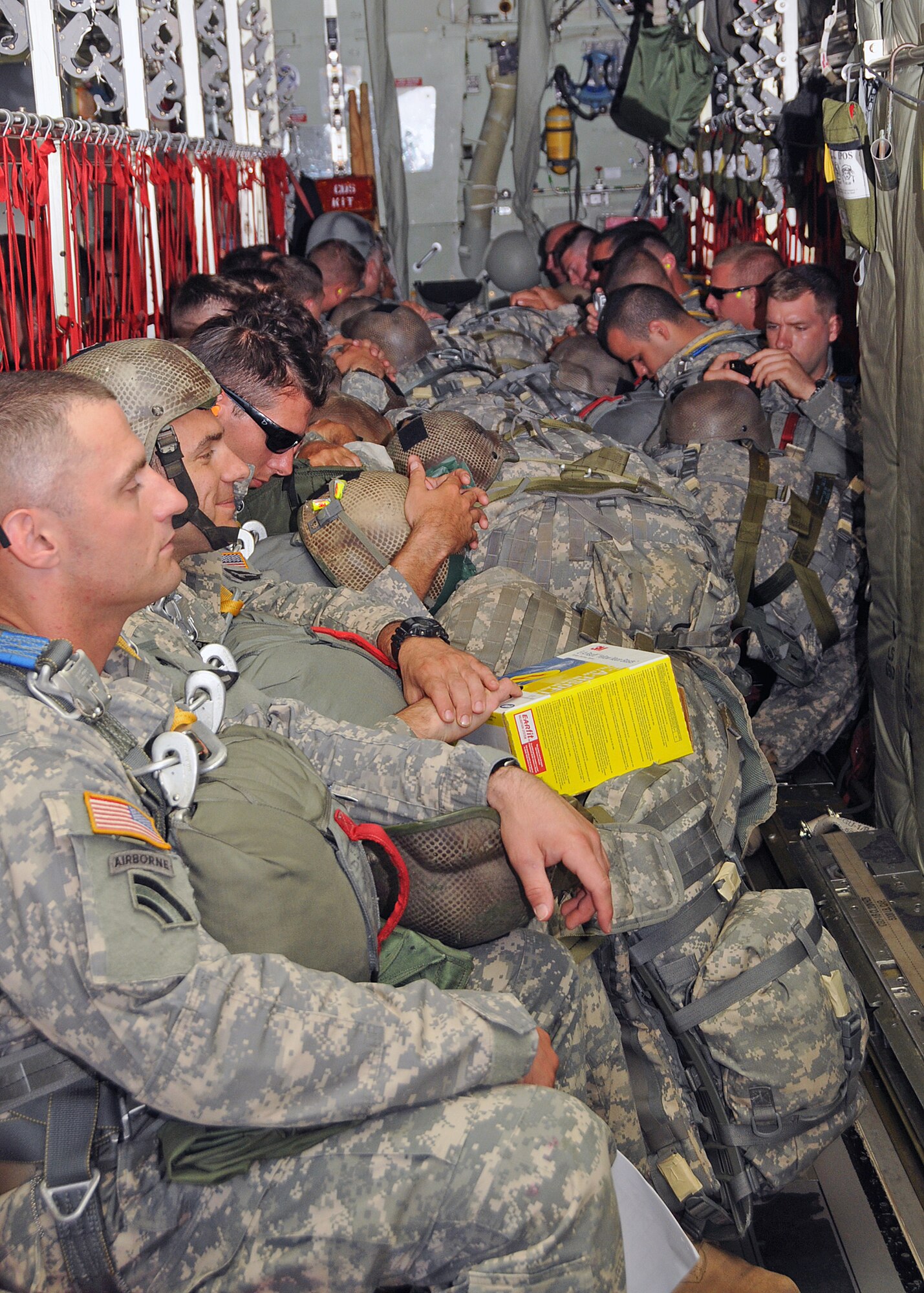 Members of the 143rd Airborne Infantry Company and the 56th Troop Command, Rhode Island Army National Guard prepare for a combat training jump from a C-130J Super Hercules flown by members of the 143d Airlift Wing, Rhode Island Air National Guard. National Guard Photo by Master Sgt Janeen Miller (RELEASED)