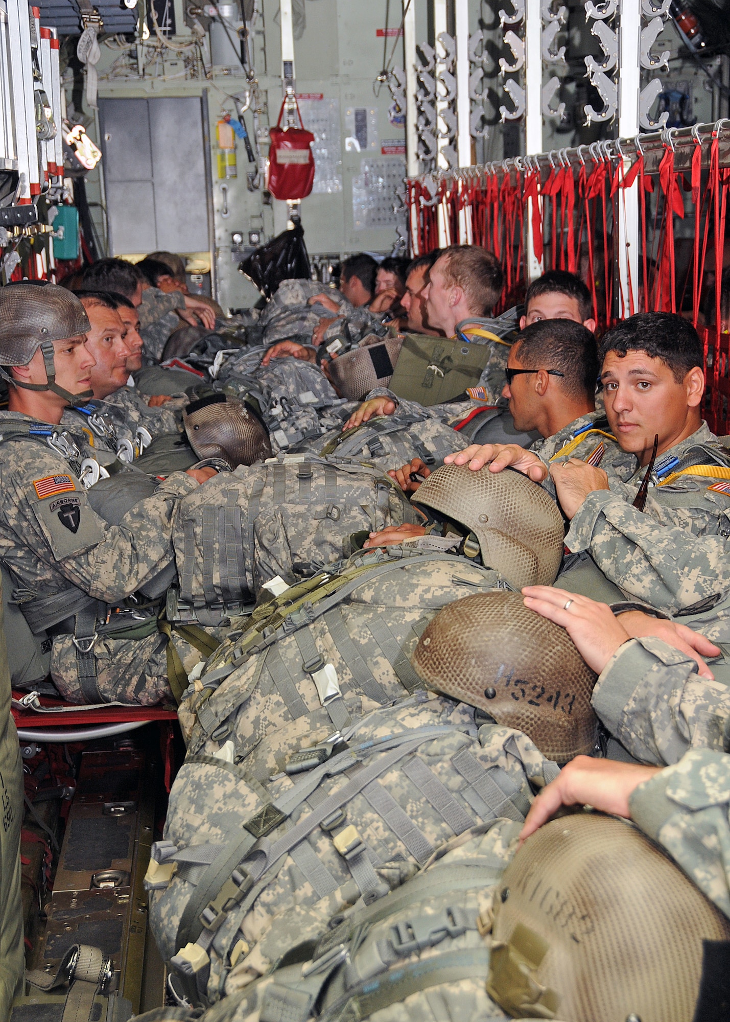 Members of the 143rd Airborne Infantry Company and the 56th Troop Command, Rhode Island Army National Guard prepare for a combat training jump from a C-130J Super Hercules flown by members of the 143d Airlift Wing, Rhode Island Air National Guard. National Guard Photo by Master Sgt Janeen Miller (RELEASED)
