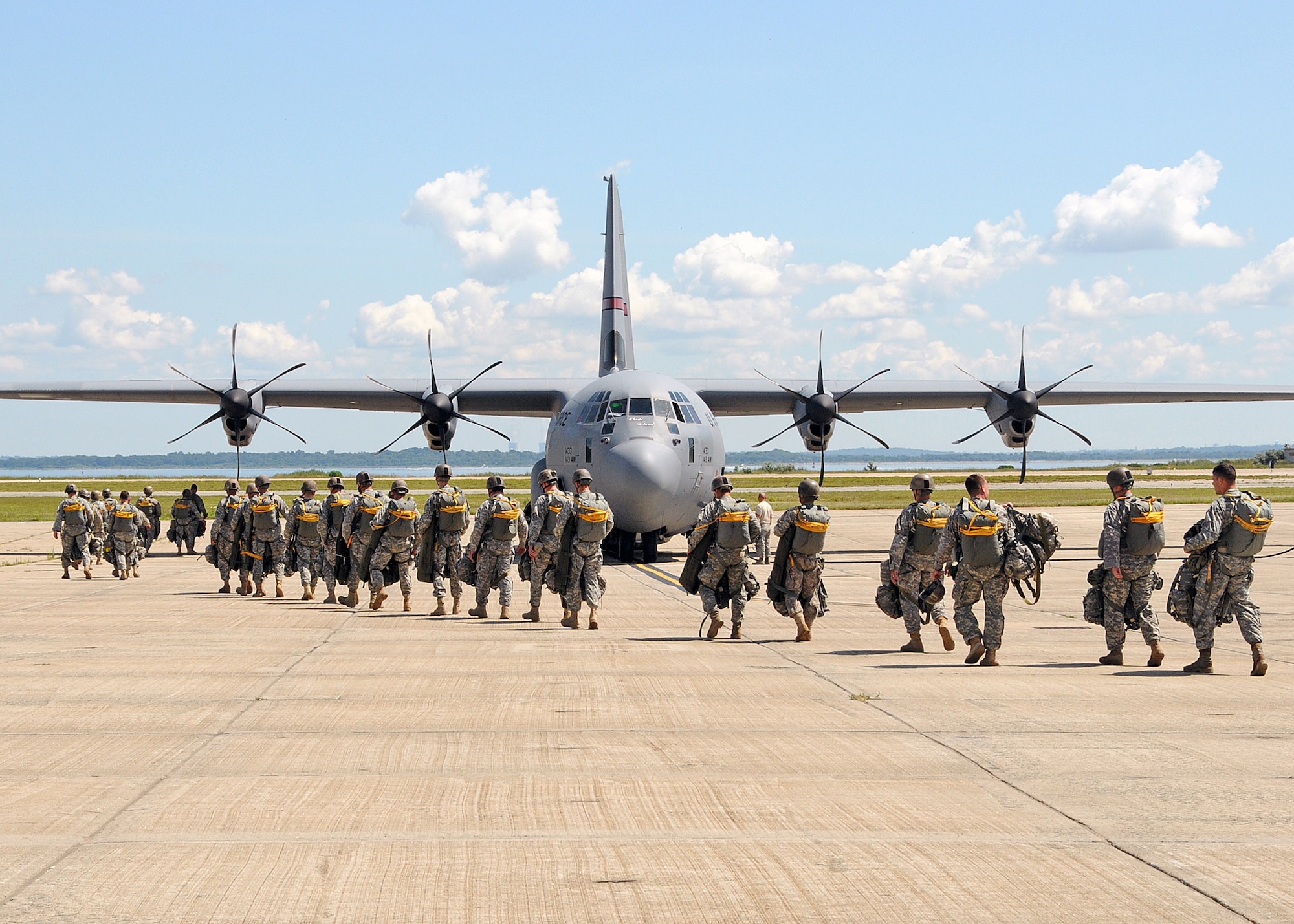 Members of the 143rd Airborne Infantry Company and the 56th Troop Command, Rhode Island Army National Guard prepare for a combat training jump from a C-130J Super Hercules flown by members of the 143d Airlift Wing, Rhode Island Air National Guard. National Guard Photo by Master Sgt Janeen Miller (RELEASED)