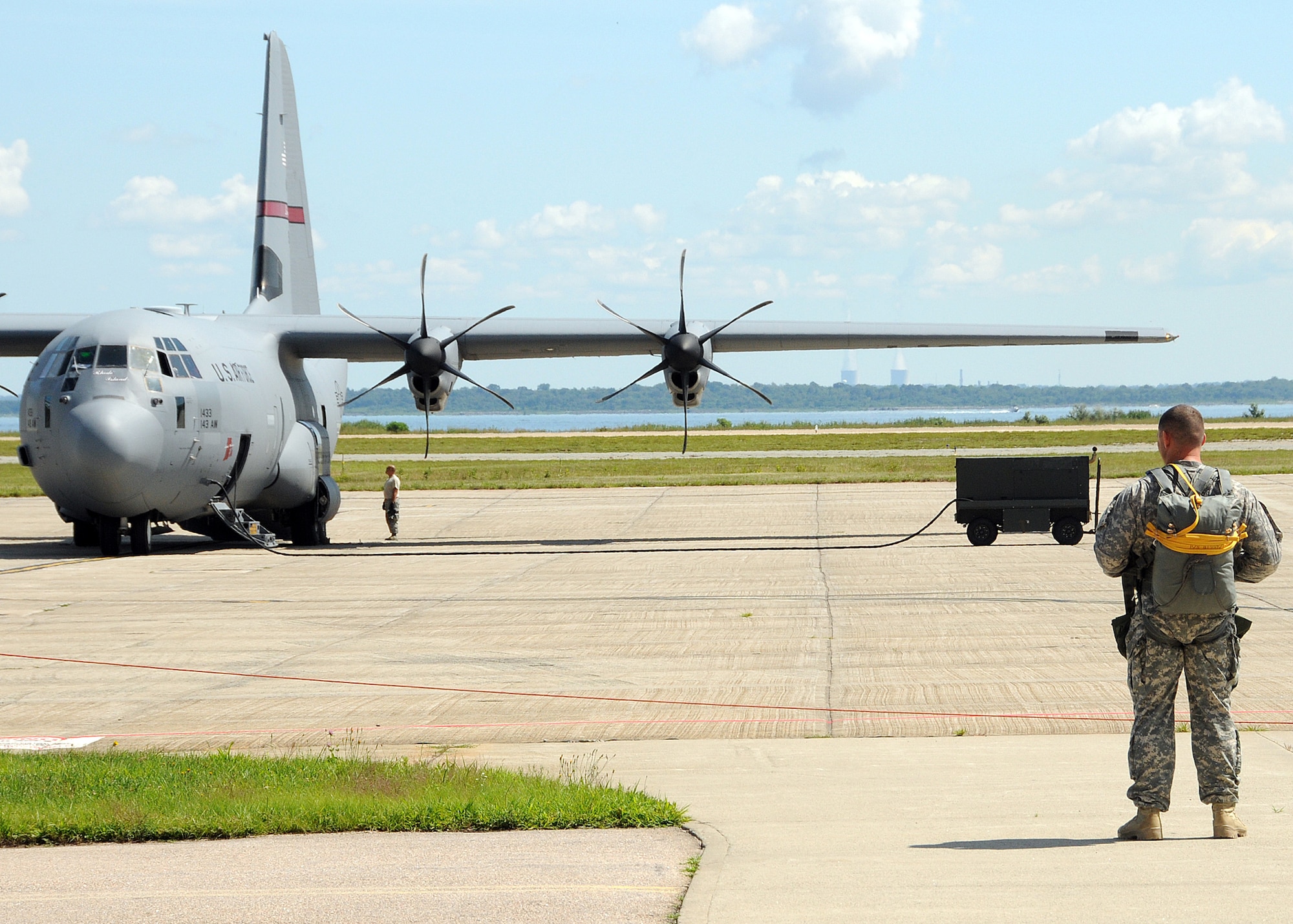 Members of the 143rd Airborne Infantry Company and the 56th Troop Command, Rhode Island Army National Guard prepare for a combat training jump from a C-130J Super Hercules flown by members of the 143d Airlift Wing, Rhode Island Air National Guard. National Guard Photo by Master Sgt Janeen Miller (RELEASED)
