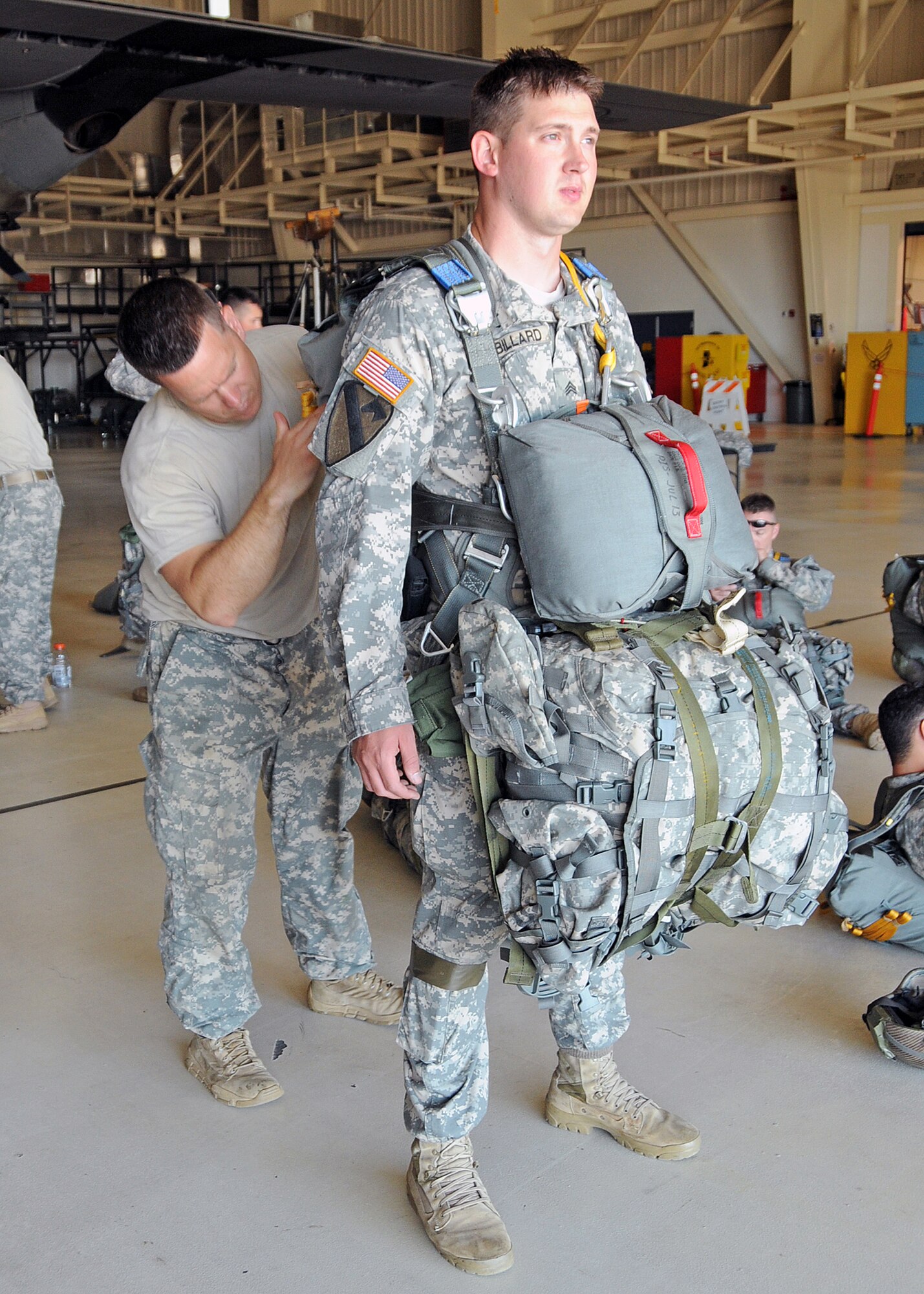 Members of the 143rd Airborne Infantry Company and the 56th Troop Command, Rhode Island Army National Guard prepare for a combat training jump from a C-130J Super Hercules flown by members of the 143d Airlift Wing, Rhode Island Air National Guard. National Guard Photo by Master Sgt Janeen Miller (RELEASED)