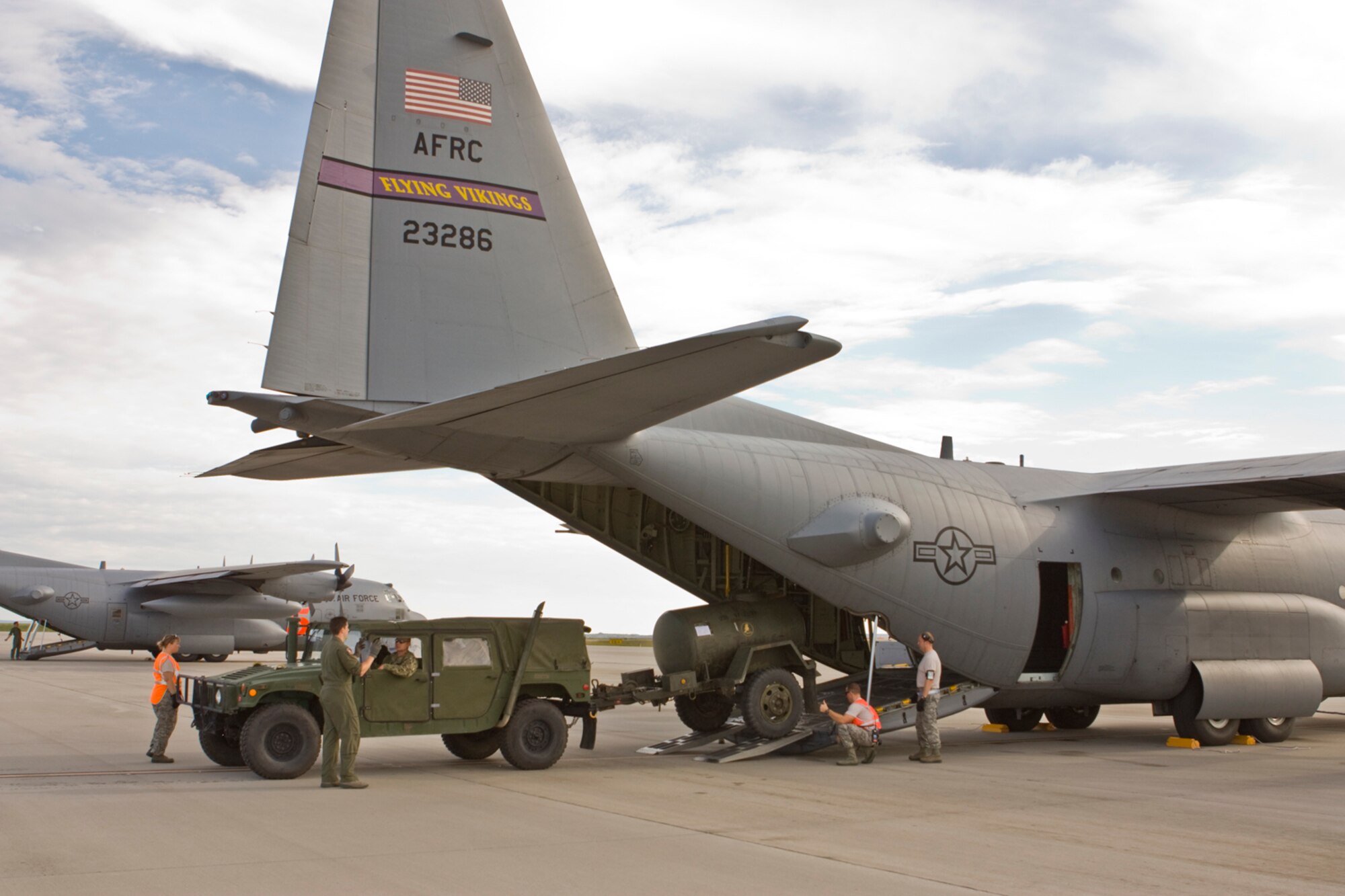 934th members load equipment on to one of their C-130s during Exercise "Patriot Experess" near Pueblo, Colo. Aug. 23.  (Air Force Photo/Tech. Sgt. Danny Richardson)
