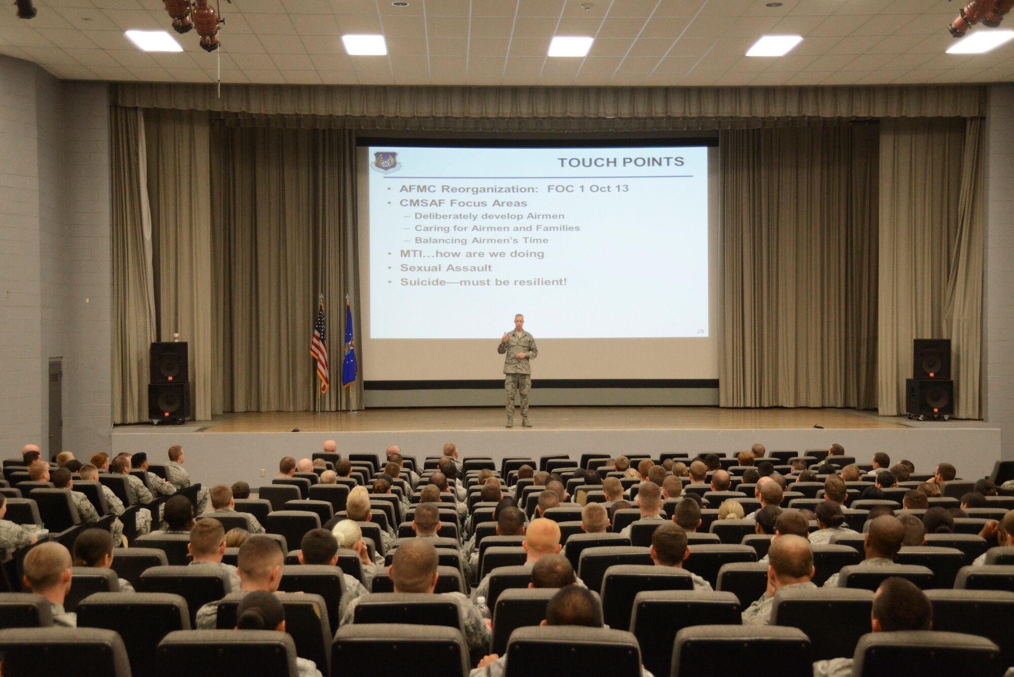 Chief Master Sgt. Michael Warner, Air Force Materiel Command command chief, discussed fiscal challenges facing the Air Force as well as the Defense Department. He also talked about issues affecting today's Airmen, which included possible changes in promotions and assignments. (U.S. Air Force photo by Rebecca Amber)