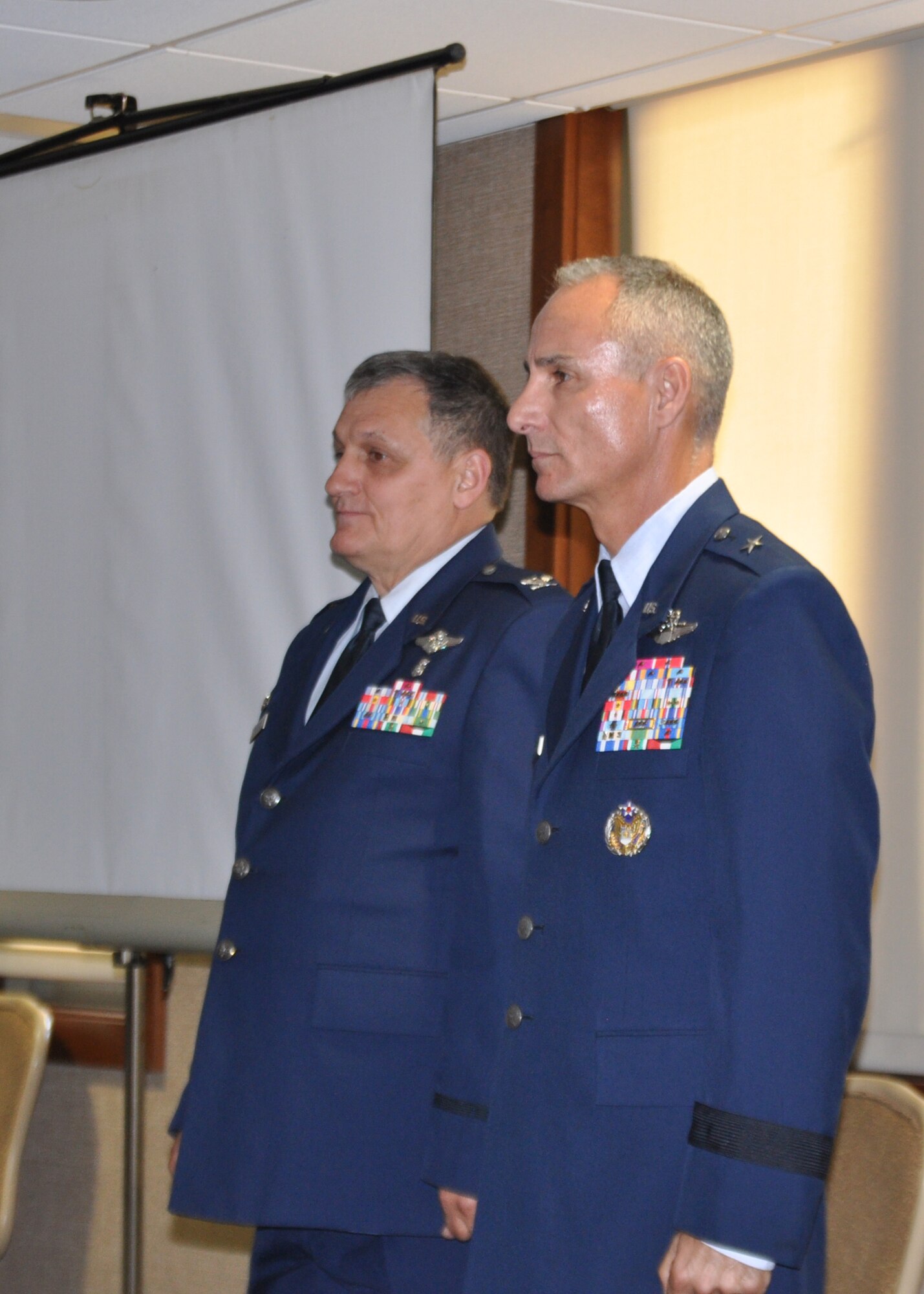 YOUNGSTOWN AIR RESERVE STATION, Ohio--U.S. Air Force Reserve Brigadier General Udo K. “Karl” McGregor (right), Deputy Director, Air Force Strategic Planning, and U.S. Air Force Reserve Colonel Ronnie J. Roberts (left), 910th Medical Squadron commander,  face the audience during the beginning of Roberts retirement ceremony here, August 3, 2013. Roberts retired after a 33-year military career. U.S. Air Force photo by MSgt. Robert Barko, Jr.