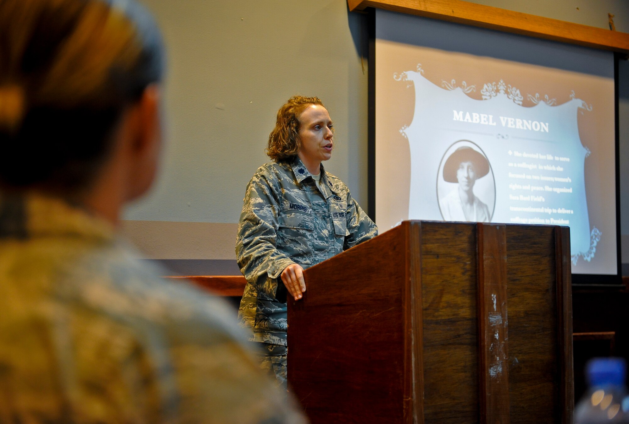 Lt. Col. Sirena Morris addresses women and men alike attending the Women?s Equality Day celebration at the 379th Air Expeditionary Wing in Southwest Asia, Aug. 26, 2013. The colonel?s words and many others quoted during the event served as mentoring points and notes of motivation. Morris is the 379th Expeditionary Force Support Squadron commander and a Fayetteville, N.C., native. (U.S. Air Force photo/Senior Airman Benjamin Stratton)