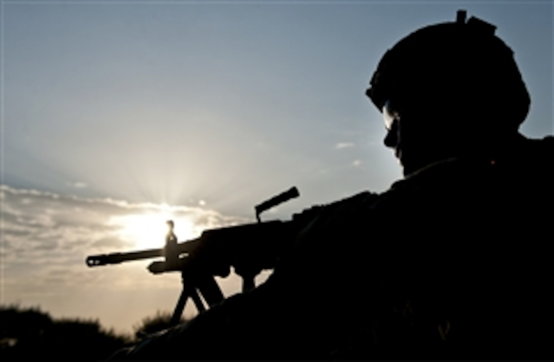 A U.S. soldier provides security during a patrol around Forward Operating Base Fenty in Nangarhar province, Afghanistan, Aug. 22, 2013.