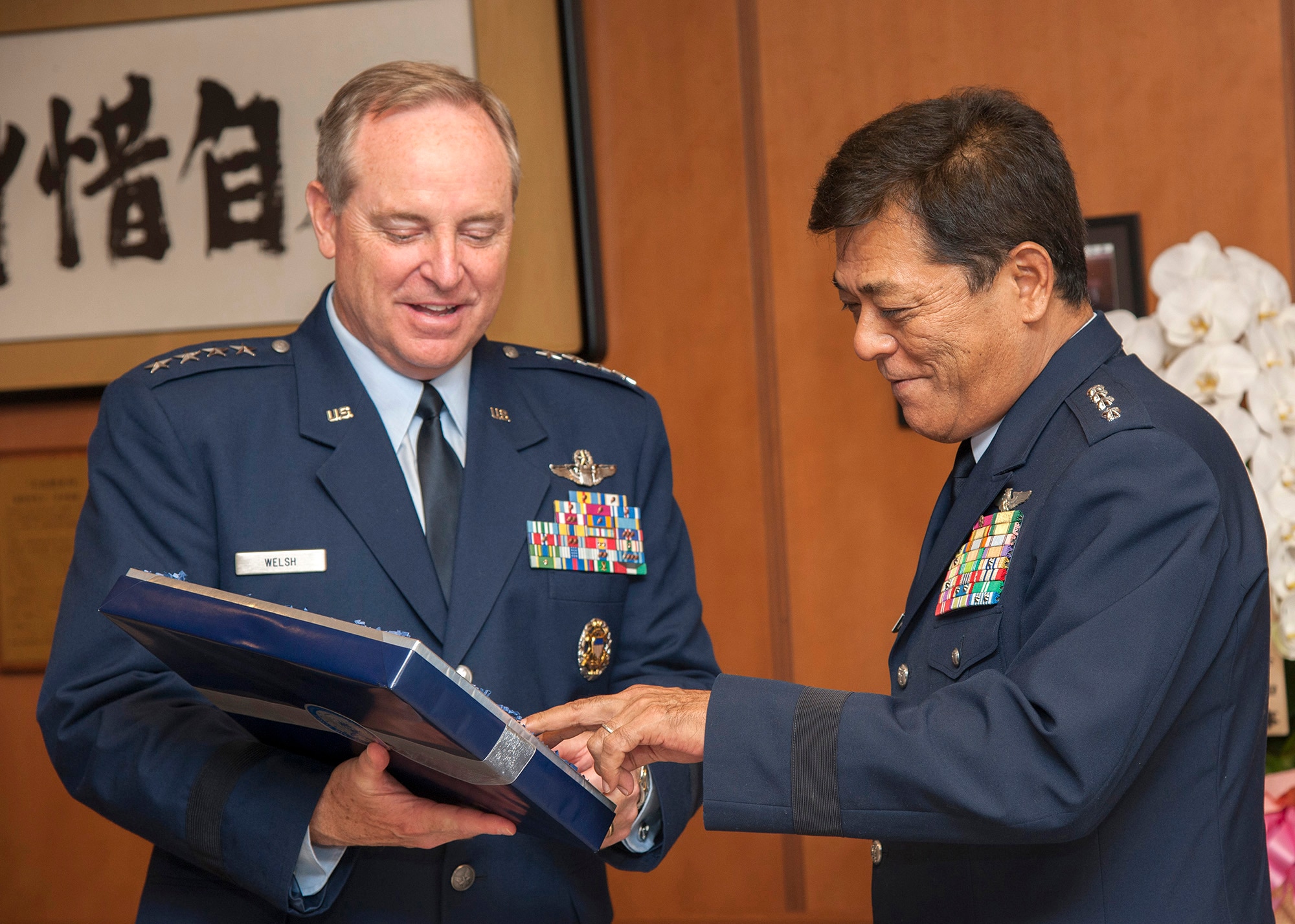 Air Force Chief of Staff Gen. Mark A. Welsh III meets with Gen. Harukazu Saitoh, Japan Air Self Defense Force chief of staff, at the Ministry of Defense building in Tokyo, Japan, Aug. 26, 2013. As part of a two-week tour of the Pacific, Welsh met with military partners in Korea and Japan, as well as Airmen and their families, to discuss opportunities and challenges in the region.  