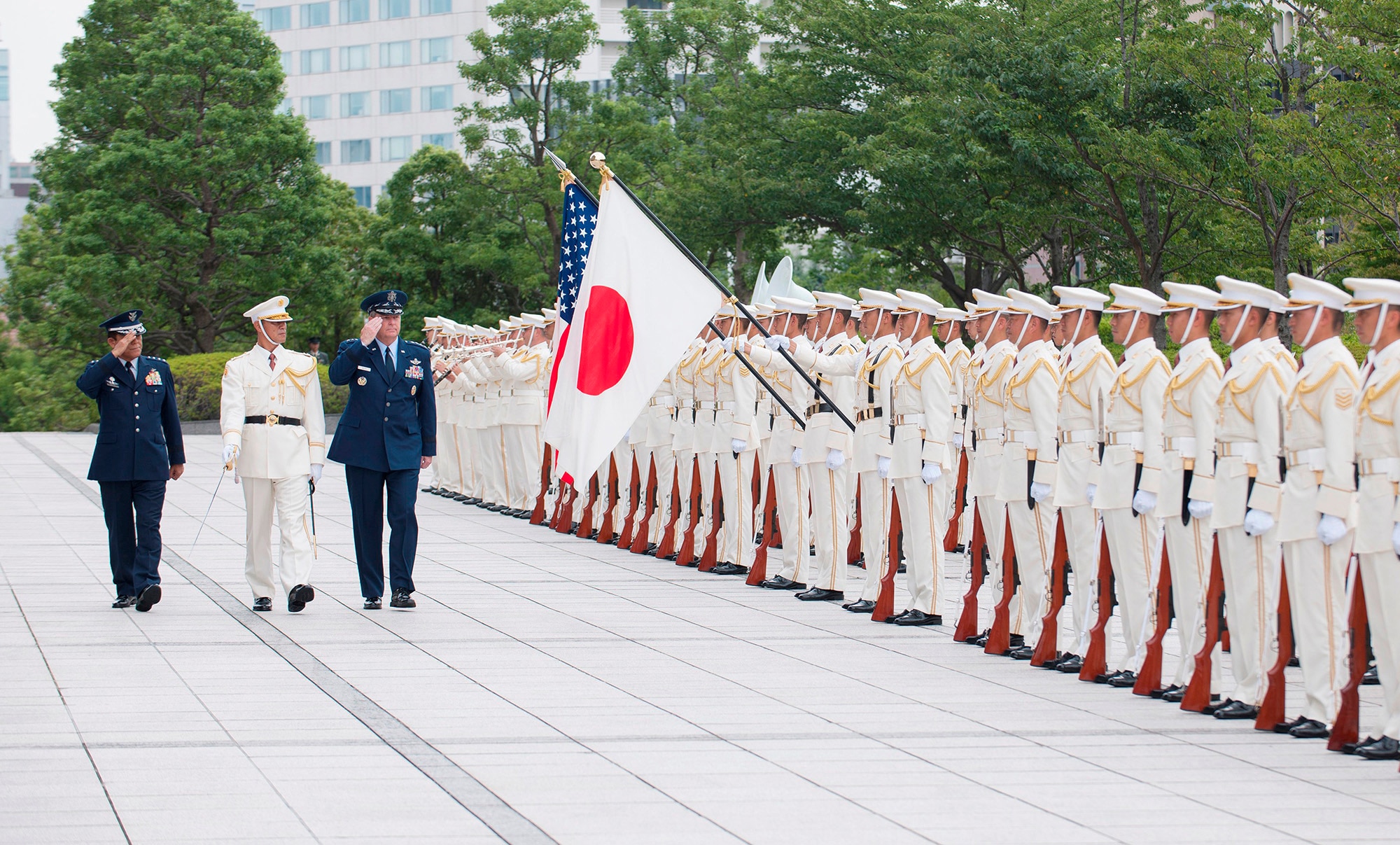 Air Force Chief of Staff Gen. Mark A. Welsh III is welcome by Gen. Harukazu Saitoh, Japan Air Self Defense Force chief of staff, and an honor cordon at the Ministry of Defense in Tokyo, Japan, Aug. 26, 2013. 