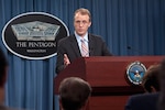 Pentagon press secretary George Little, shown here in an Oct. 4, 2012, briefing, said Monday that the Defense Department would muscle through the furlough period.