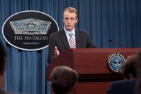 Pentagon press secretary George Little, shown here in an Oct. 4, 2012, briefing, said Monday that the Defense Department would muscle through the furlough period.