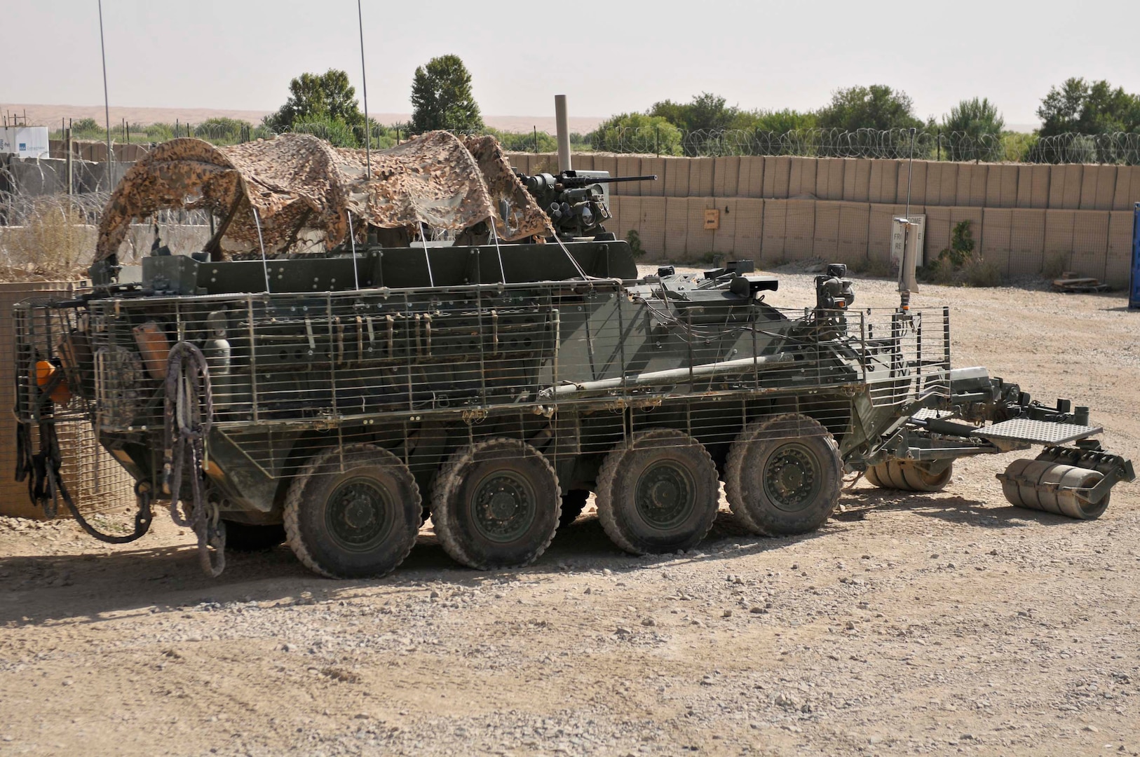 Some western state governors have requested conversion from tanks to Stryker brigades for their National Guard units. Here, U.S. Army troops with 1st Squadron, Combined Task Force Dragoon, occupy a security position in a Stryker vehicle July 20, 2013 at Zangabad, Afghanistan.