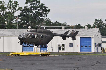 Soldiers from the Sandston-based Detachment 1, Company A, 2nd Battalion, 151st Aviation Regiment depart for the Texas border aboard a UH-72 Lakota helicopter July 29, 2013, from the Virginia National Guard's Army Aviation Support Facility in Sandston, Va.