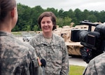 Staff Sgt. Ashley Snider, a member of the North Carolina National Guard's 139th Regional Training Institute, practices broadcast interview techniques as part of a media training exercise.