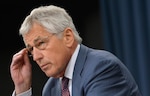 Secretary of Defense Chuck Hagel conducts a news briefing at the Pentagon in Arlington, Va., July 31, 2013, about the Strategic Choices and Management Review.
