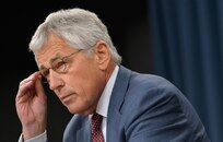 Secretary of Defense Chuck Hagel conducts a news briefing at the Pentagon in Arlington, Va., July 31, 2013, about the Strategic Choices and Management Review.