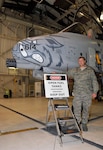Staff Sgt. Michael Rybarczyk, an aircraft fuel systems craftsman with the 188th Maintenance Group, poses with one of the 188th Fighter Wing's A-10C Thunderbolt IIs. Rybarczyk was recognized for his actions during the wing's 2012 deployment to Bagram, Afghanistan, and was nominated by the wing for the Lance P. Sijan Leadership Award.