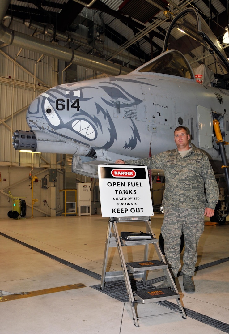 Staff Sgt. Michael Rybarczyk, an aircraft fuel systems craftsman with the 188th Maintenance Group, poses with one of the 188th Fighter Wing's A-10C Thunderbolt IIs. Rybarczyk was recognized for his actions during the wing's 2012 deployment to Bagram, Afghanistan, and was nominated by the wing for the Lance P. Sijan Leadership Award.