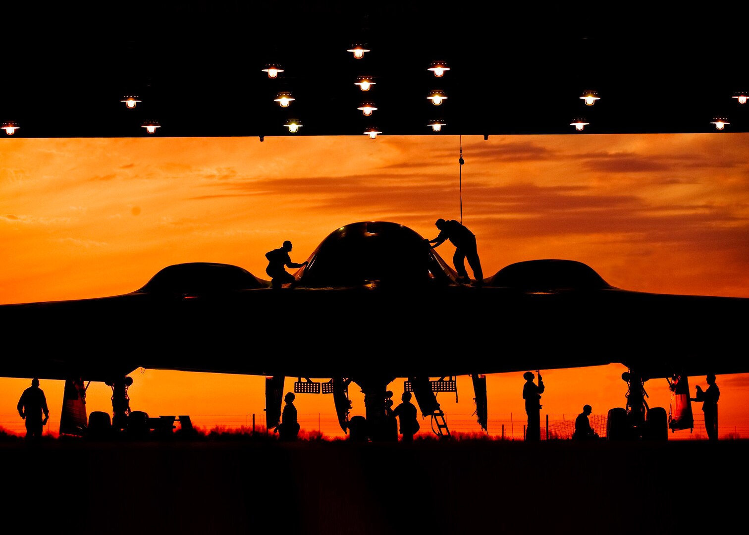 During early-morning operations, 131st Bomb Wing Missouri Air National Guard mantainers service a B-2 Stealth at Whiteman Air Force Base, Mo.
