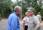 Gov. Jay Nixon speaks with Brig. Gen. David Newman, joint chief of staff for the Missouri National Guard, about the Guard's assistance during the flooding that took place in several south-central counties between Aug. 7 and 8, 2013.