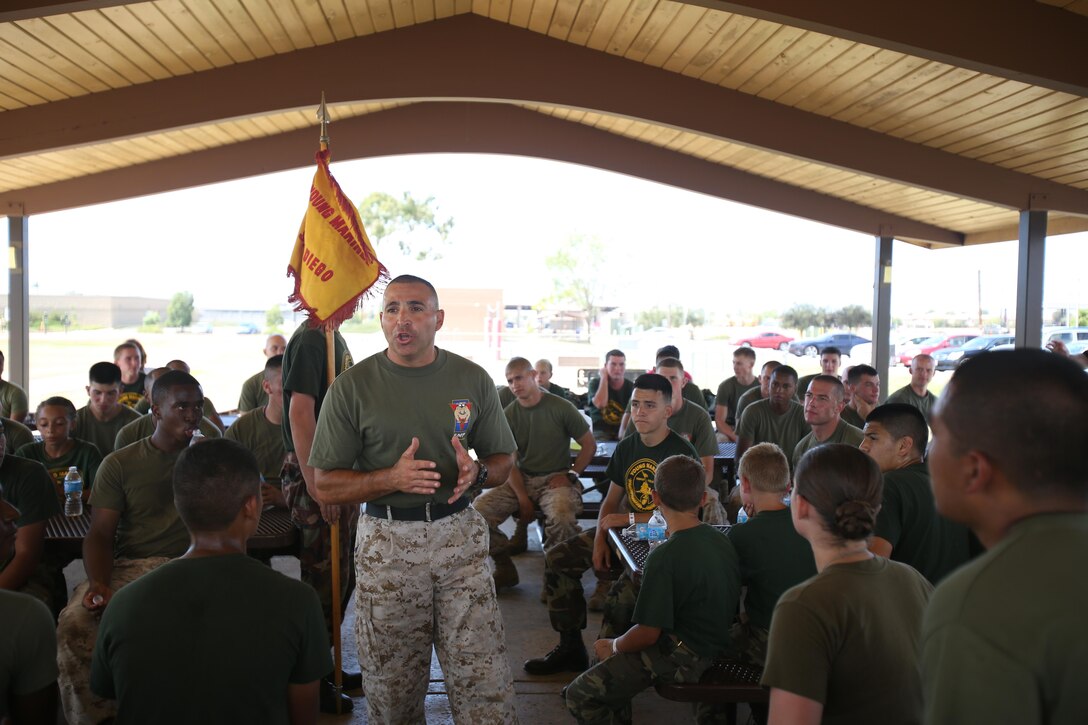 Sgt. Maj. Richard Charron, Marine Corps Air Station Miramar sergeant major, speaks to Young Marine participants at Mills Park aboard the air station, Aug. 24. Charron told the Young Marines about their potential future in the Marine Corps, and how the active-duty Marines were there to help them and provide guidance. 