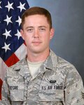 Senior Airman Joey DeFore, with the 116th Air Control Wing, helped two bystander rescue six children from an overturned bus in Warner Robins, Ga., Aug. 15, 2013.