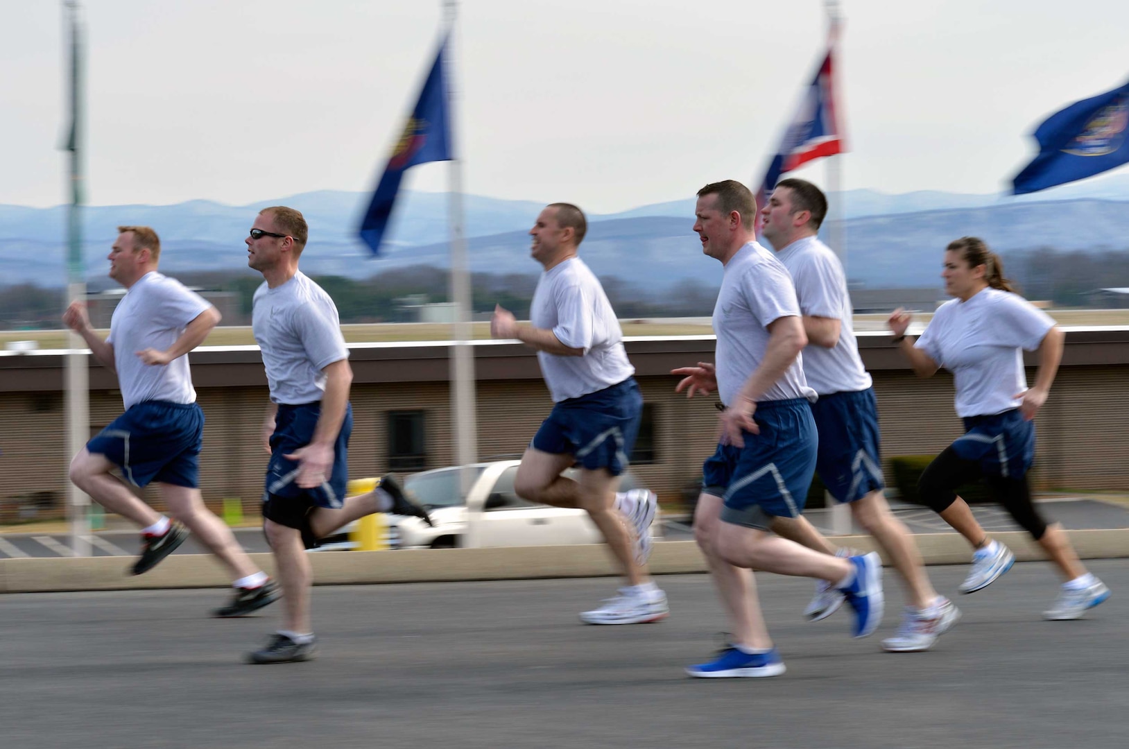 Airmen attending the NCO Academy Class 13-4 participate in group physical training at the I.G. Brown Training and Education Center, March 4, 2013.