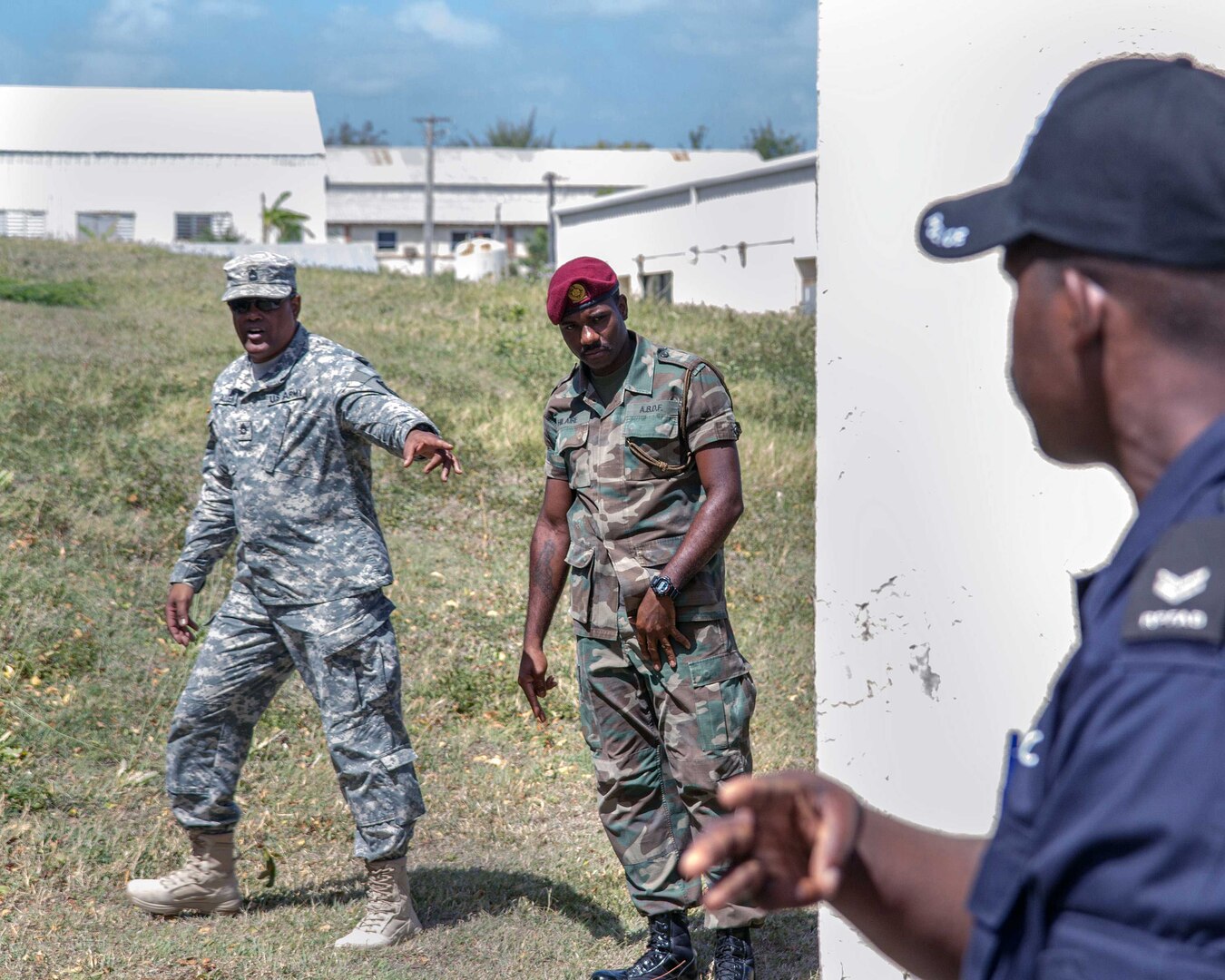 Army Sgt. 1st Class Calvin Allen, a facilitator with the Florida Army National Guard's 211th Regiment, shares his knowledge of non-verbal communication techniques, in St. John's, Antigua, Aug. 15, 2013. The seminar is part of the on-going Florida National Guard's State Partnership Program Exchange and is intended to help the process of further developing junior noncommissioned officers within the ABDF and the Antigua Police Force.