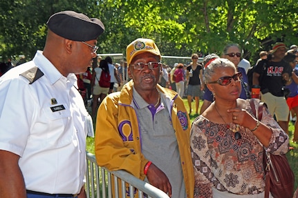 Sgt. 1st Class Samuel Isabell, with Joint Forces Headquarters, District of Columbia National Guard, assists attendees during the 50th Anniversary of Dr. Martin Luther King's famous March on Washington, where he gave his historic "I Have A Dream" speech. District of Columbia National Guard service members were on hand to assist local law enforcement agencies with security, safety, and traffic control.