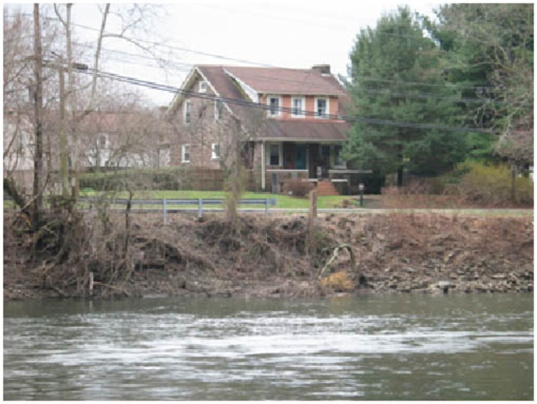 The project consists of bank stabilization of the right bank of the Schuylkill River along River Road between Laurelwood Road and the Hanover Street Bridge. A short section of the steep, eroding right bank of the Schuylkill River along River Road in North Coventry Township is shown in the picture. The total project length is 1200 feet in two reaches.